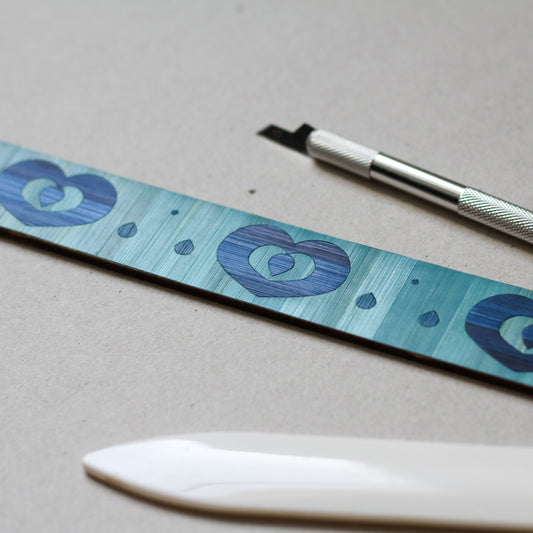 échantillon de motifs en marqueterie de paille.